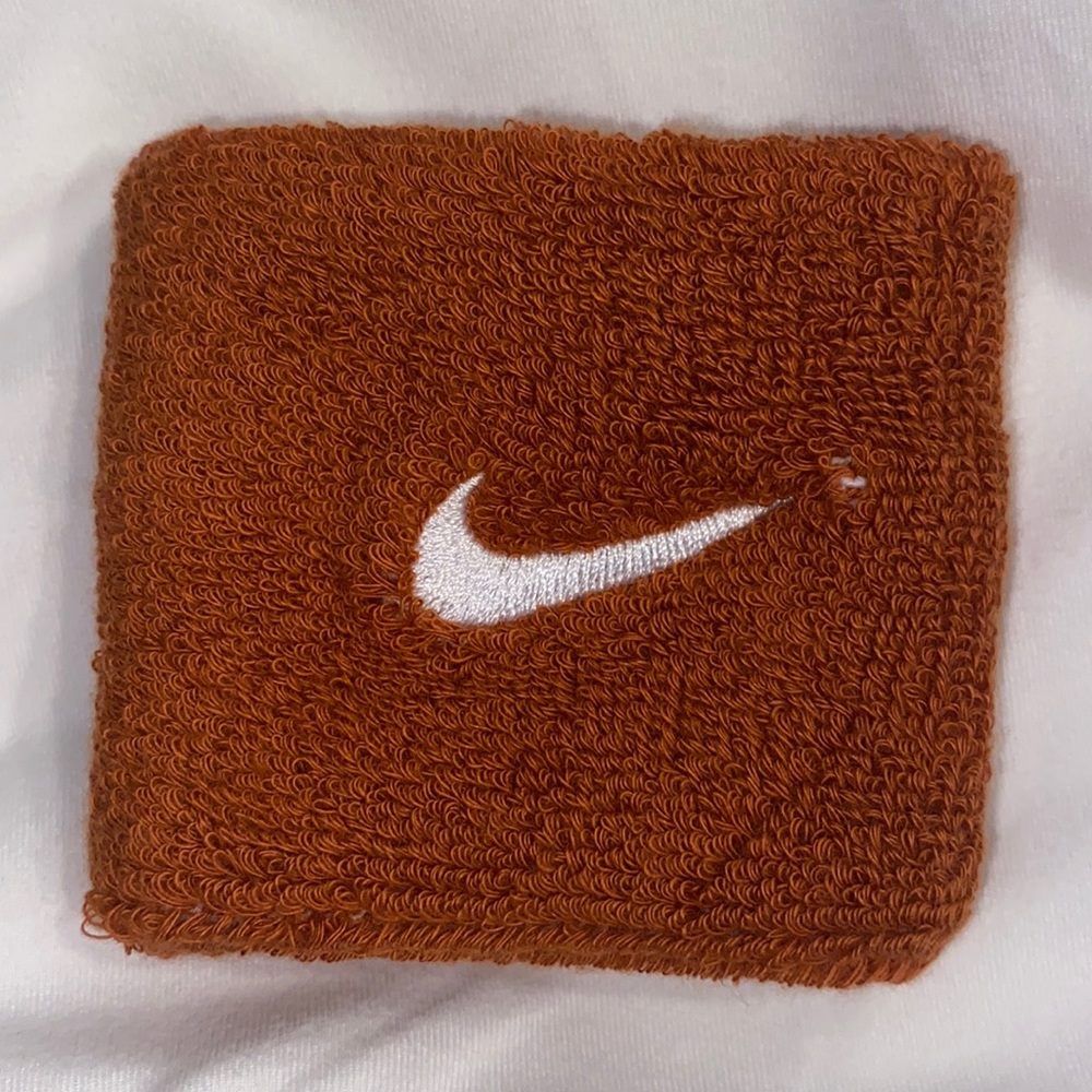 Texas Nike women’s tennis wrist band
